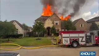 Watch: Lightning strike causes house fire south of The Woodlands