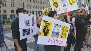 Demonstrators march on Magnificent Mile demanding justice for Mahsa Amini