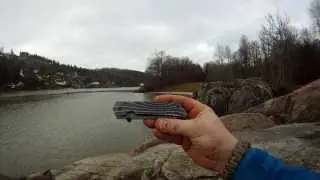 Testing a fake Rockstead framlock knife as my EDC