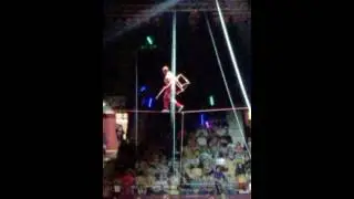 shrine circus PERSON SIT CHAIR ON ROPE 2015