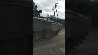Crowd of people stopped Russian tank column