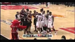 Joel Przybilla and Carlos Boozer exchange words