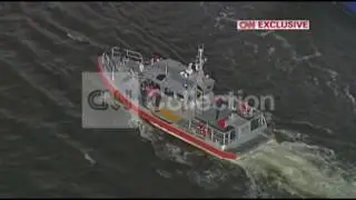 CRIPPLED CRUISE AERIALS - PEOPLE LEAVING SHIP