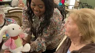 Christmas Eve Gift Giving | Transitional Memory Care at Chateau Madeleine, Melbourne FL