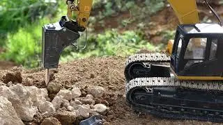 RC Caterpillar Excavator Rock Breaking & Truck Loading &mdash; Part 1