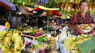 Plenty of fresh food, noodle soup, yellow pancakes, Cambodian food market, Asian street food
