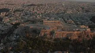 Aerial Perspective circling Acropolis of Athens in Golden Hour Sunset Light