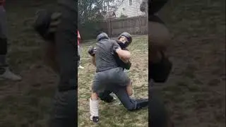 Inside trip takedown in mma