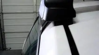2010 Volkswagen Beetle with Thule Rapid Traverse Black AeroBlade Roof Rack by Rack Attack