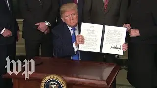 Trump signs measure hitting China with $50 billion in annual tariffs