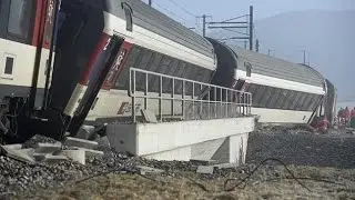 Train Carriages Derailed After Collision in Switzerland