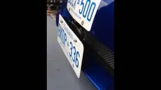 Powell Tow hook and license plate bracket