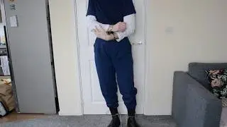 Prisoner Handcuffed in Restraint Belt and Leg Irons