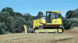 John Deere 750K Bulldozer Pushing Sand