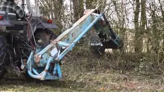 Siding up a hedge section ready for coppicing using a tractor mounted single circular saw