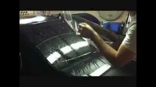 Pose film teinté ( lunette arrière berline 4 portes à coffre )
