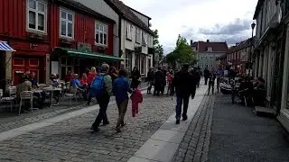 Walking through the historic Bakklandet neighborhood in Trondheim, Norway
