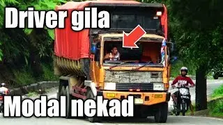 DRIVER BERNYALI BESAR MENGENDARAI TRUCK BAN KEMPES DI JALUR SITINJAU