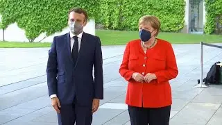 France's Macron arrives to dine with Merkel in Berlin | AFP