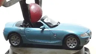 Red Hot Metal Ball vs BMW Roadster Model