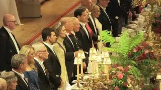 RAW: Trumps, Royals stand for toast at Windsor Castle banquet