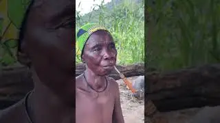 Woman from the Koma tribe smokes some tobacco from her hand carved pipe | Cameroon #shorts