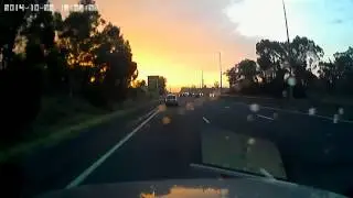 Watch the motorcycle   the car ahead does not see him changing lanes