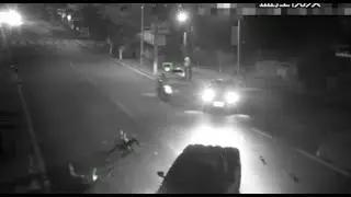 Motorcycle Collides with Vehicle at Road Intersection in Guizhou