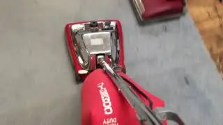 Vacuuming with the Sanitaire SC886