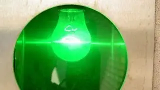Glowing bulb - ball of ice - fascinating experience LEDs light red and green