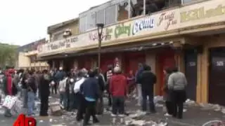 Massive Chile Quake Brings Out Looters and Heros