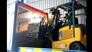 Container loading by SLIP SHEET - Lotus Rice