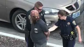 Taking a ride to jail.