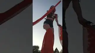 Stilt walker go-go show R.E.D.