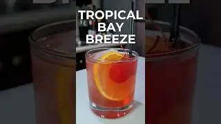 How to Make the Perfect TROPICAL BAY BREEZE 🌴🍍🍒 | This Drink Tastes Like Vacation 🏖️ #shorts #drink