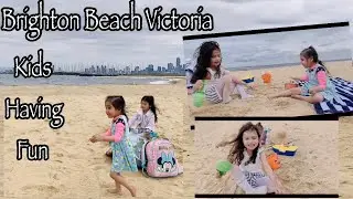 Brighton Beach Victoria||kids precious time||Having fun playing in the sand