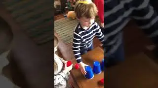 Dominic, Bruce, Winnie stack cups