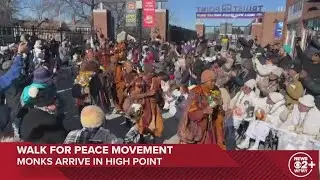 Buddhist monks arrive at Truist Point ballpark in High Point