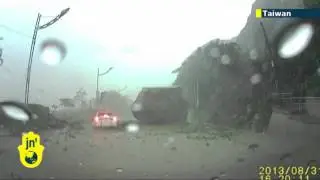 Massive boulder nearly crushes car during Taiwan landslide