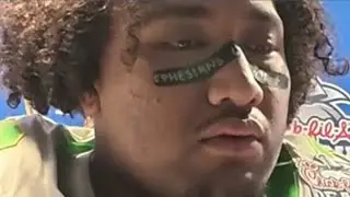 Oregon offensive lineman Iapani Laloulu expresses his love for Ducks fans