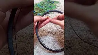 Crafted with the vibrant Peacock Feather Dreamcatcher  #PeacockFeather #DreamcatcherDIY #HomeDecor