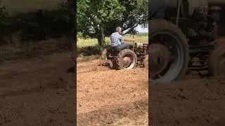 Gibson tractor and plow