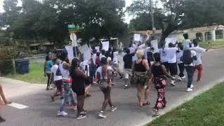 We Are Marching For A Change,  Justice, Peace And To End Gun Violence. Gloves Up Guns Down