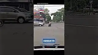 An Ambulance Escort Leads to an Accident at a Red Light