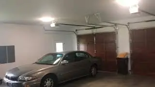 3 white 8365 chain drive lift master garage door opener at my best teacher friends house.
