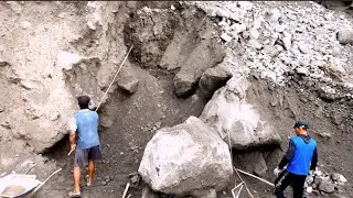 1Two Large Rocks in the Middle of the Mining Site 