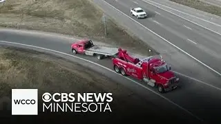 Video shows vehicle falling off tow truck into high-speed traffic