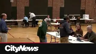 Polls open in the U.S. as Americans vote for their next president