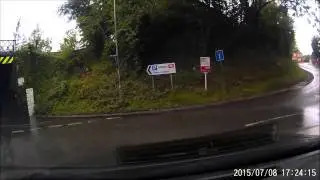 Driving through the flooded bridge, Silfield, Wymondham