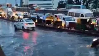 Watch Commuters Struggle With Bengalurus Flooded Streets After Heavy Rains